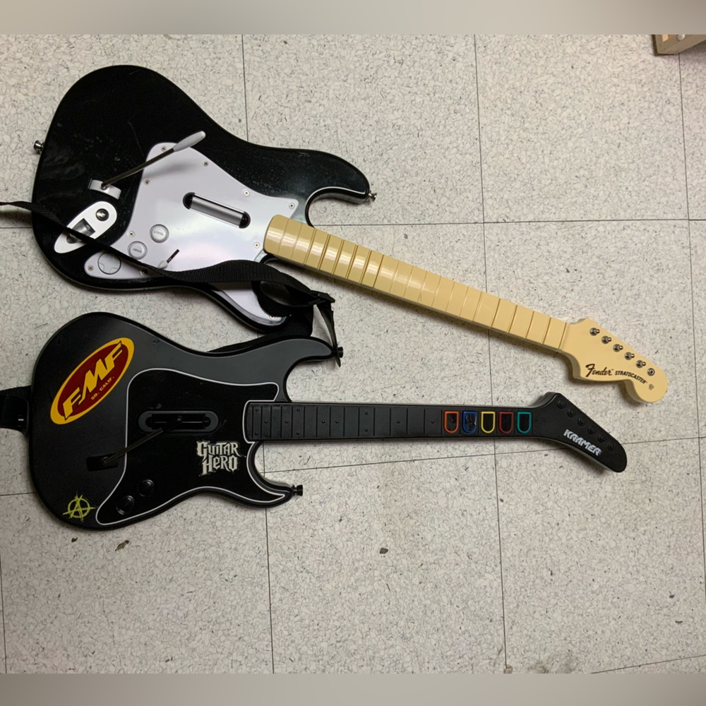 PS3 wireless Rock Band Harmonix & guitar Hero Guitars. One has cosmetic defects.
